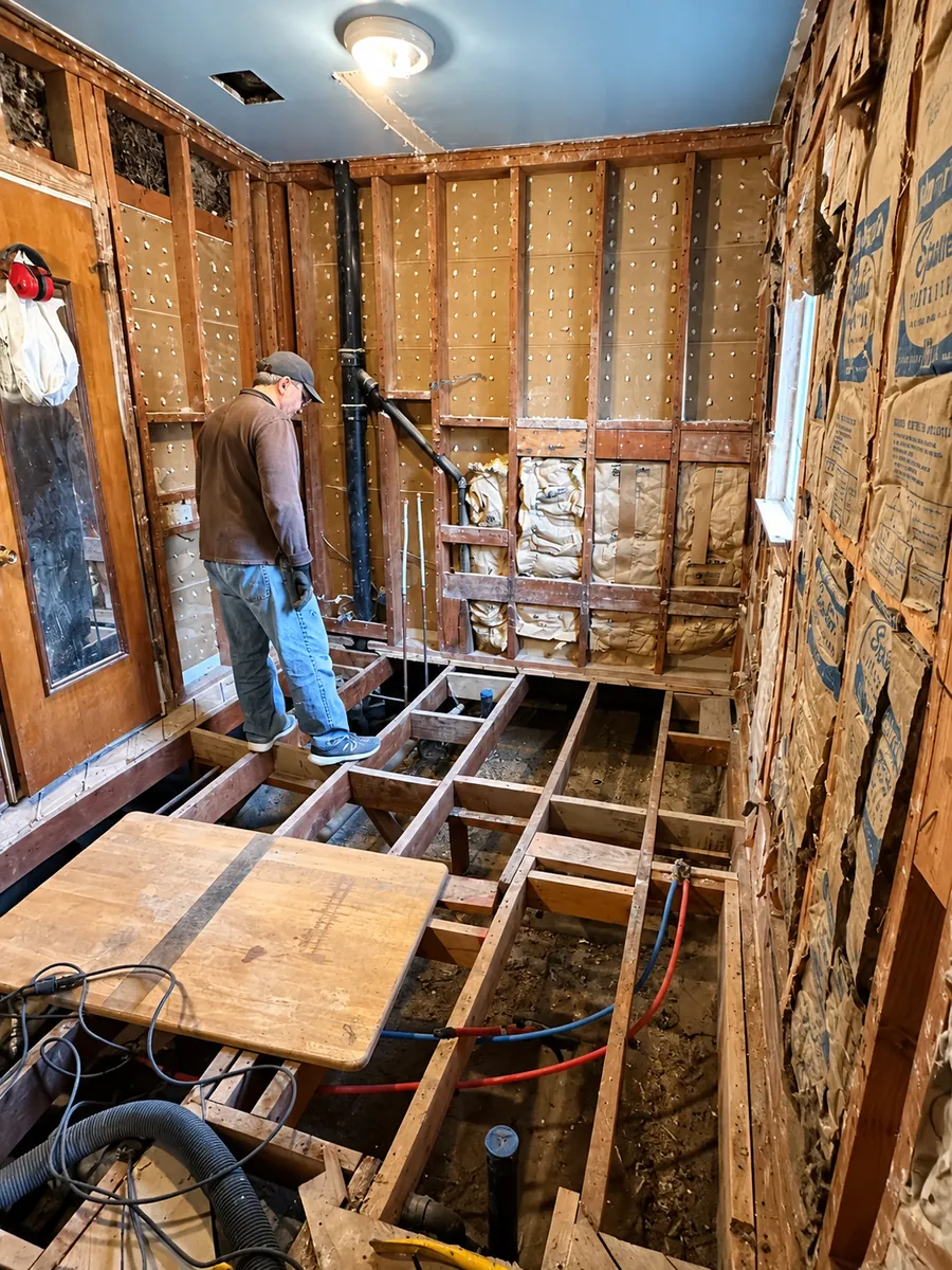 Framing and rough plumbing during a full gut Clovis, CA bathroom remodel