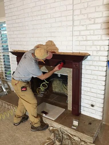 Fireplace renovation and mantel installation in Fresno CA home